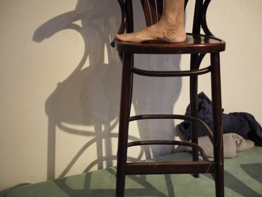 Wooden chairs and the artist's muse